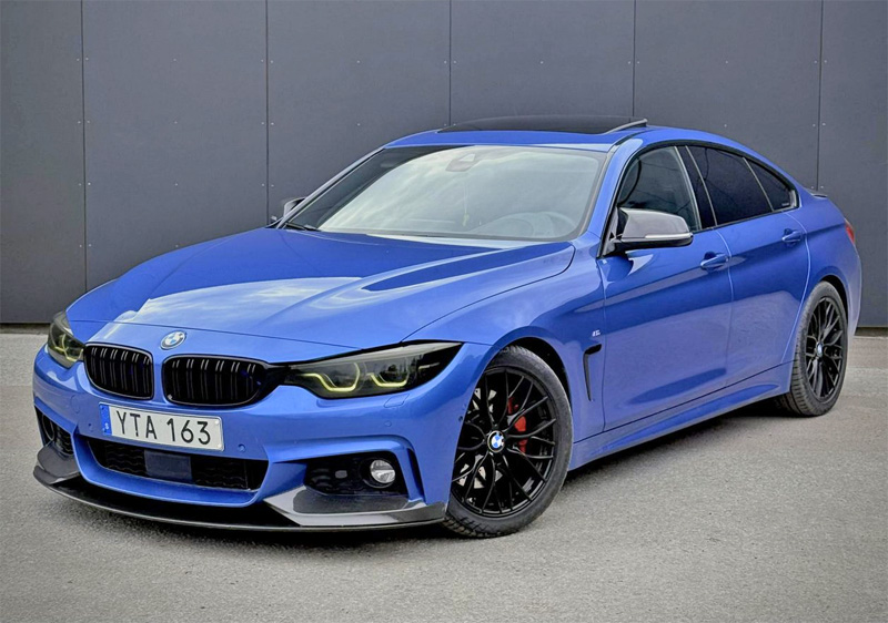 Blå BMW 440 I Xdrive Gran Coupé stulen i Sollentuna