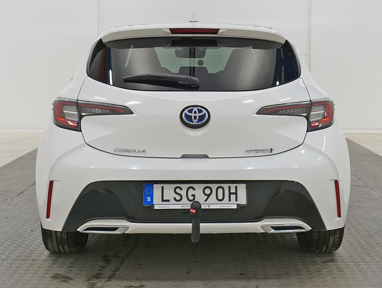 Vit Toyota Corolla Hybrid stulen i Solna