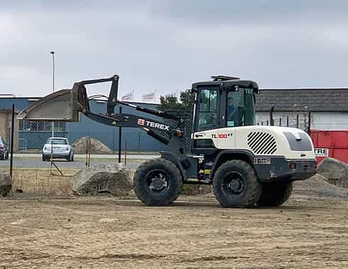 957701